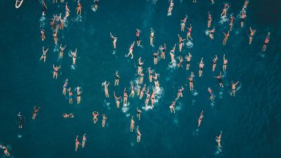 Swimmers in the ocean, solopreneur competition